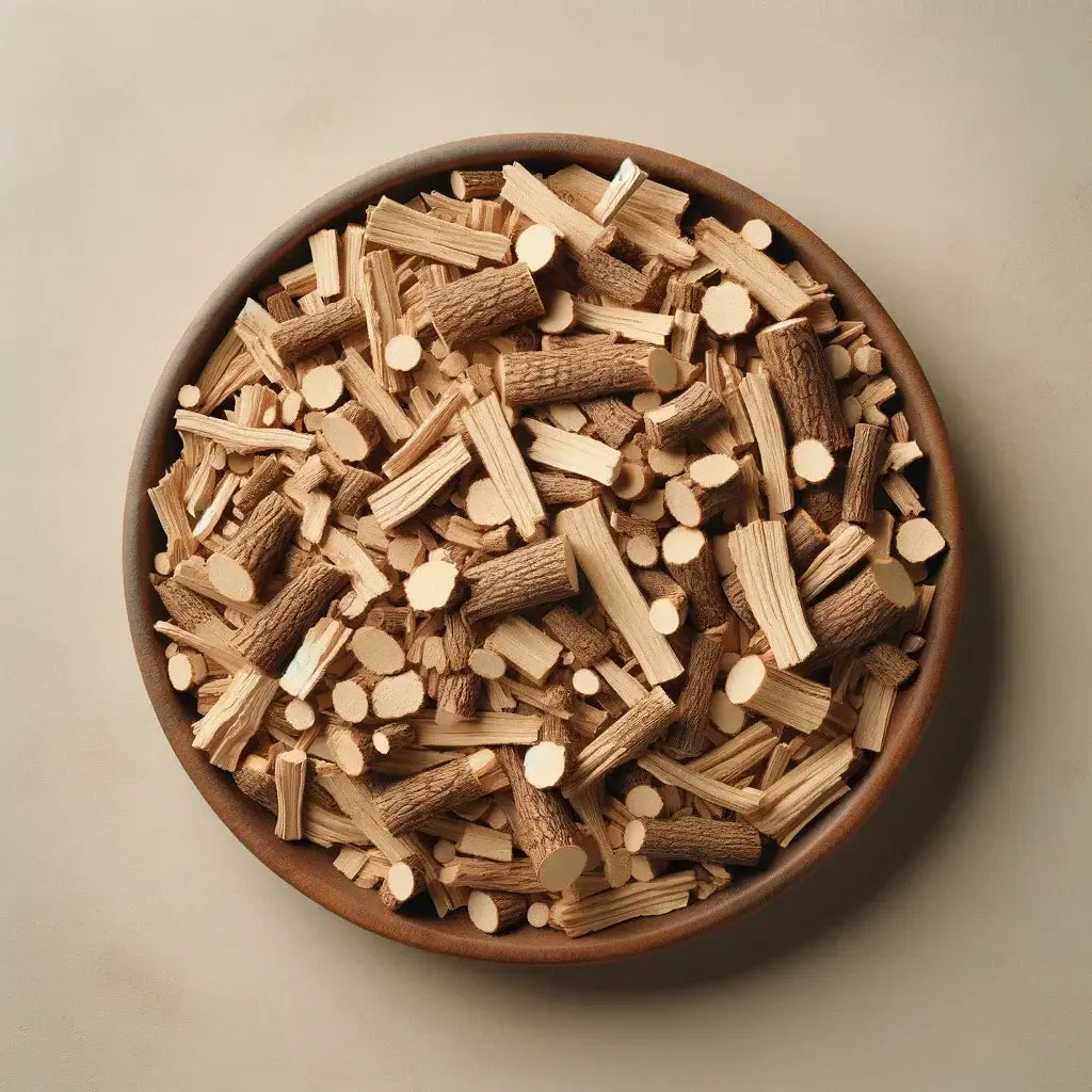 bBowl filled with dried, cut Eleuthero Root, emphasizing the herbal root's preparation for traditional medicinal use.