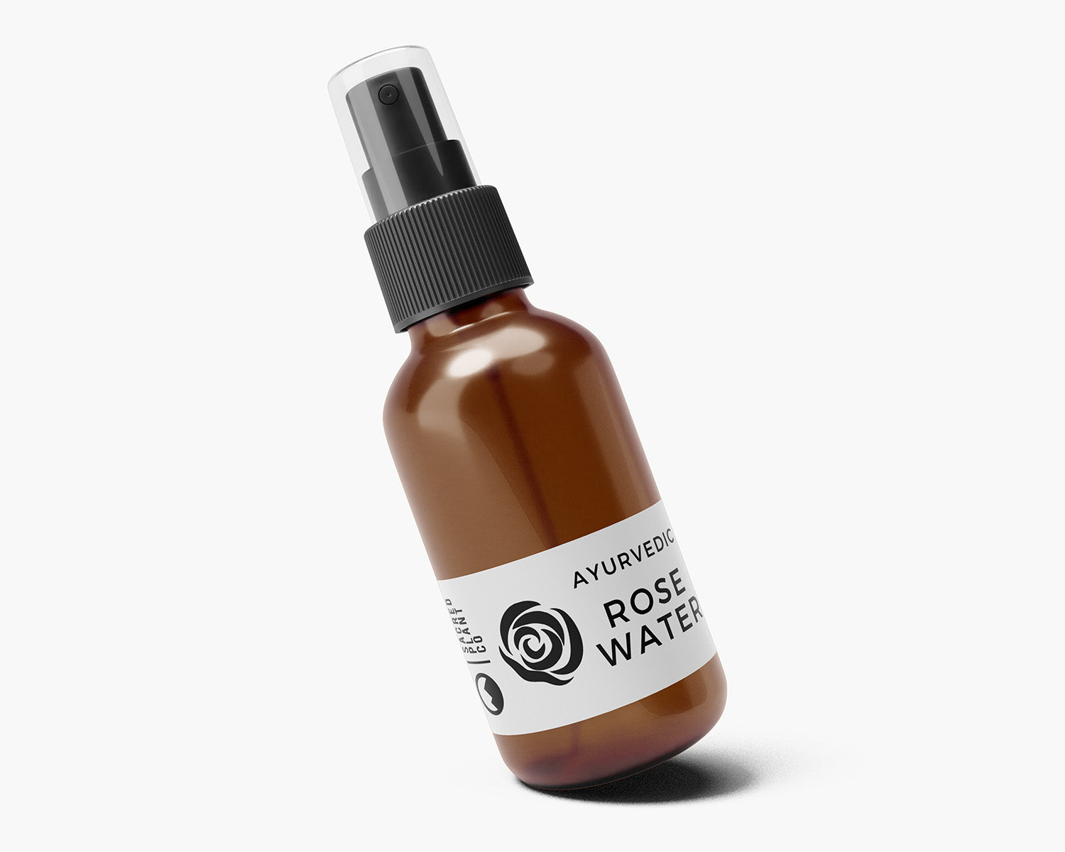 Angled product shot of Sacred Plant Co’s Ayurvedic Rose Water spray, highlighting the fine mist nozzle and elegant packaging.