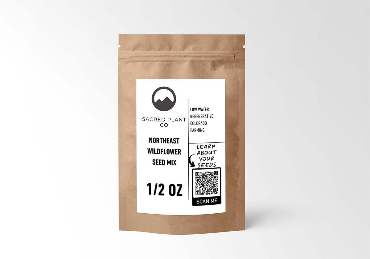 1/2 oz kraft seed pouch labeled Northeast Wildflower Seed Mix by Sacred Plant Co with QR code to learn about the seeds and eco-friendly farming.