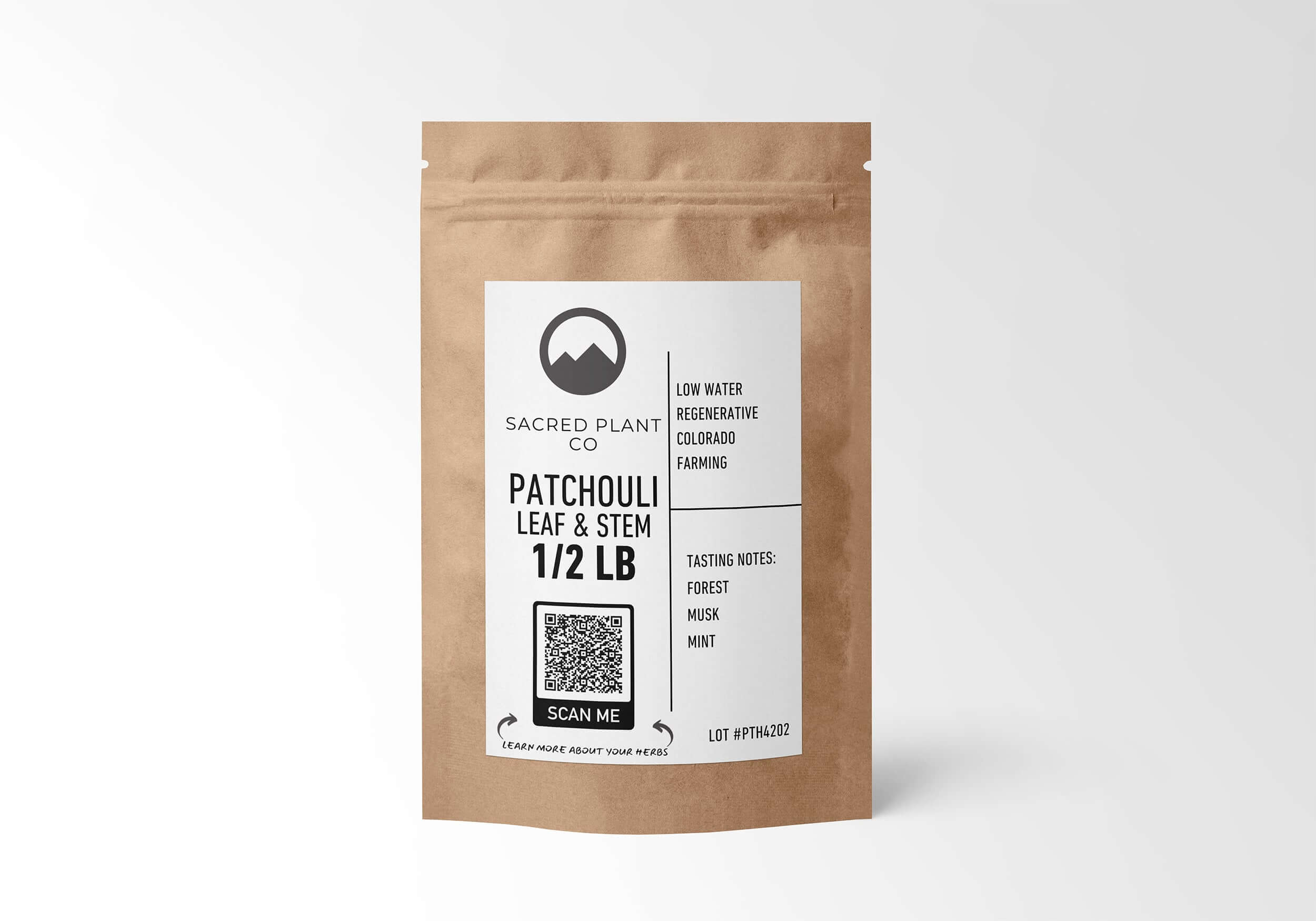 Eco-friendly kraft paper bag containing 1/2 LB of Patchouli Leaf & Stem, sustainably farmed with notes of forest, musk, and mint.