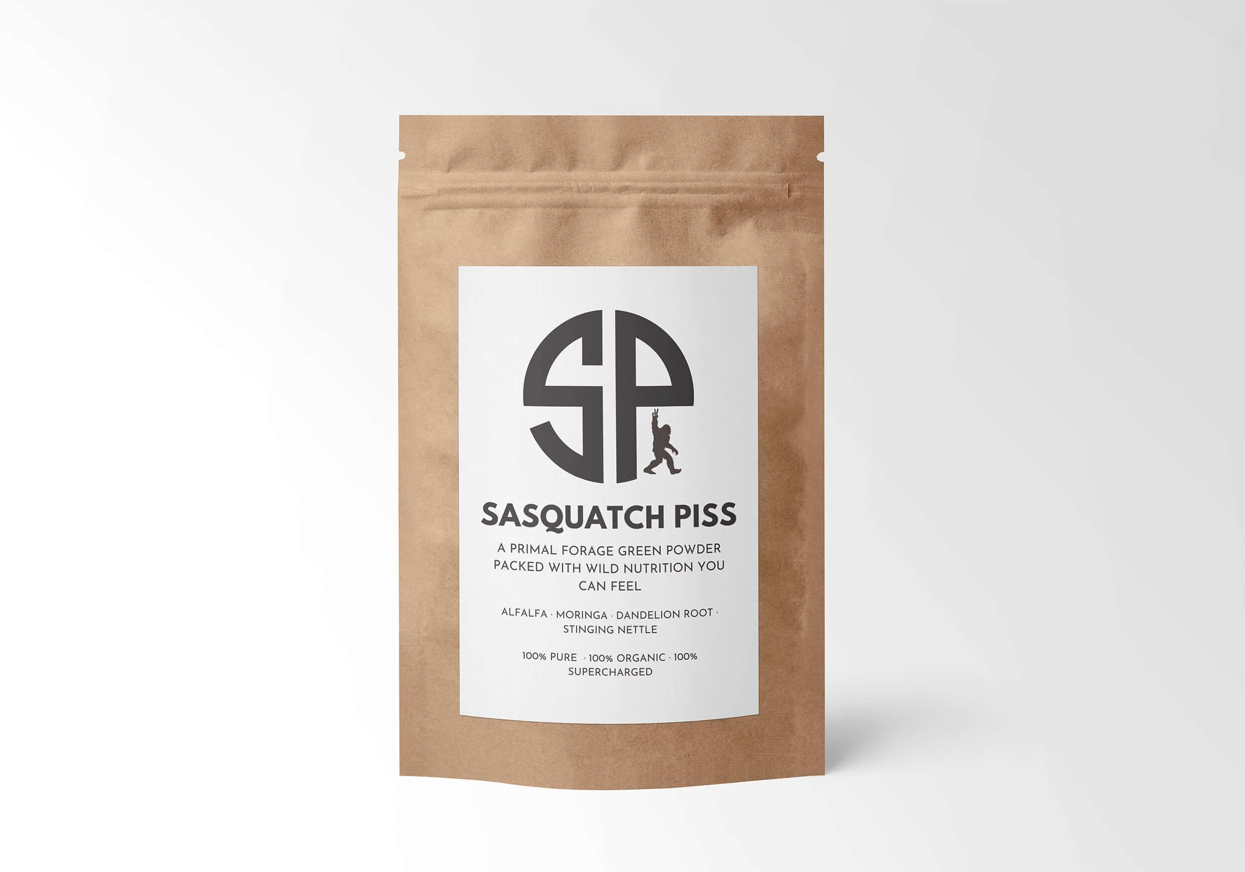 Sasquatch Piss 100% organic green powder in kraft packaging, offering primal nutrition with Alfalfa, Moringa, and Nettle for enhanced health and energy.