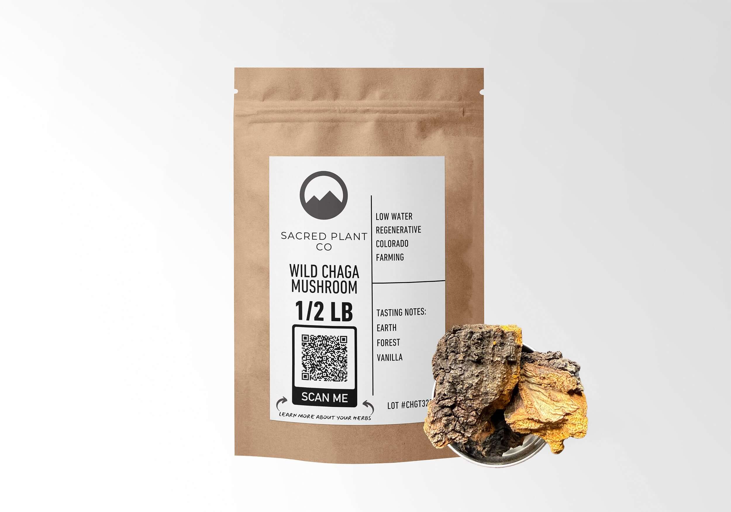 Sacred Plant Co Wild Chaga Mushroom 1/2 LB in kraft paper packaging with a sample in a silver tin, used for immune support, reducing inflammation, and promoting overall health.