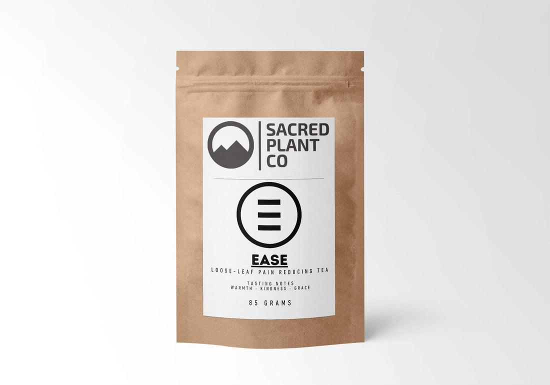 Sacred Plant Co Ease Herbal Tea 85g Bag front view with eco-friendly kraft paper packaging, pain-relieving blend of Holy Basil and White Willow Bark for soothing inflammation, crafted with sustainable farming practices.
