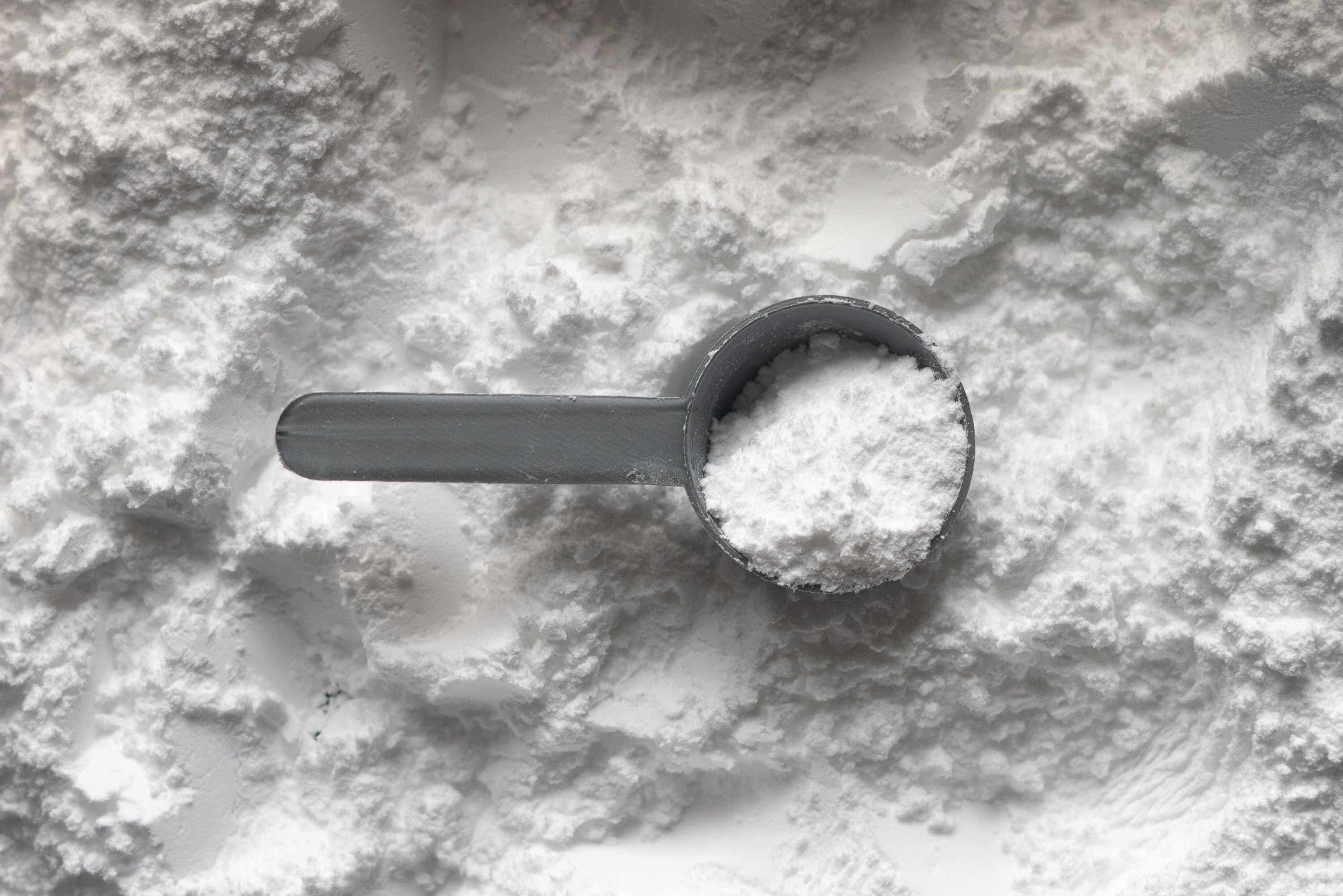 Sacred Plant Co Arrowroot Powder with soft, refined texture and bright white color, emphasizing the powder&