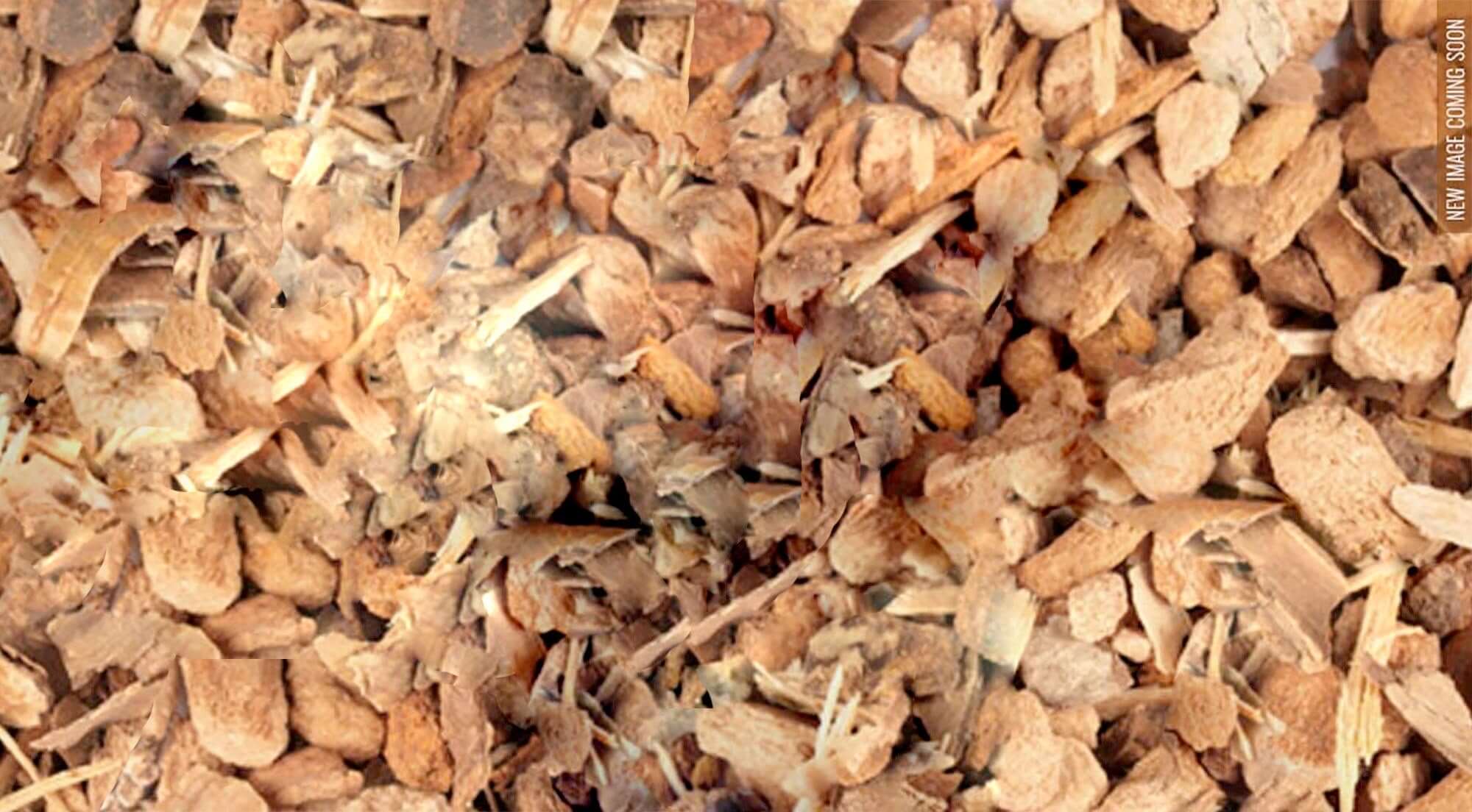 Close-up of premium dried birch bark pieces, showcasing their natural earthy brown and beige tones. Sustainably harvested and finely cut for use in herbal teas, tinctures, and traditional remedies.