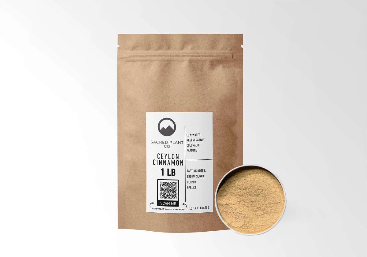 Sacred Plant Co Ceylon Cinnamon 1 LB kraft stand-up pouch shown with a sample of the powder.