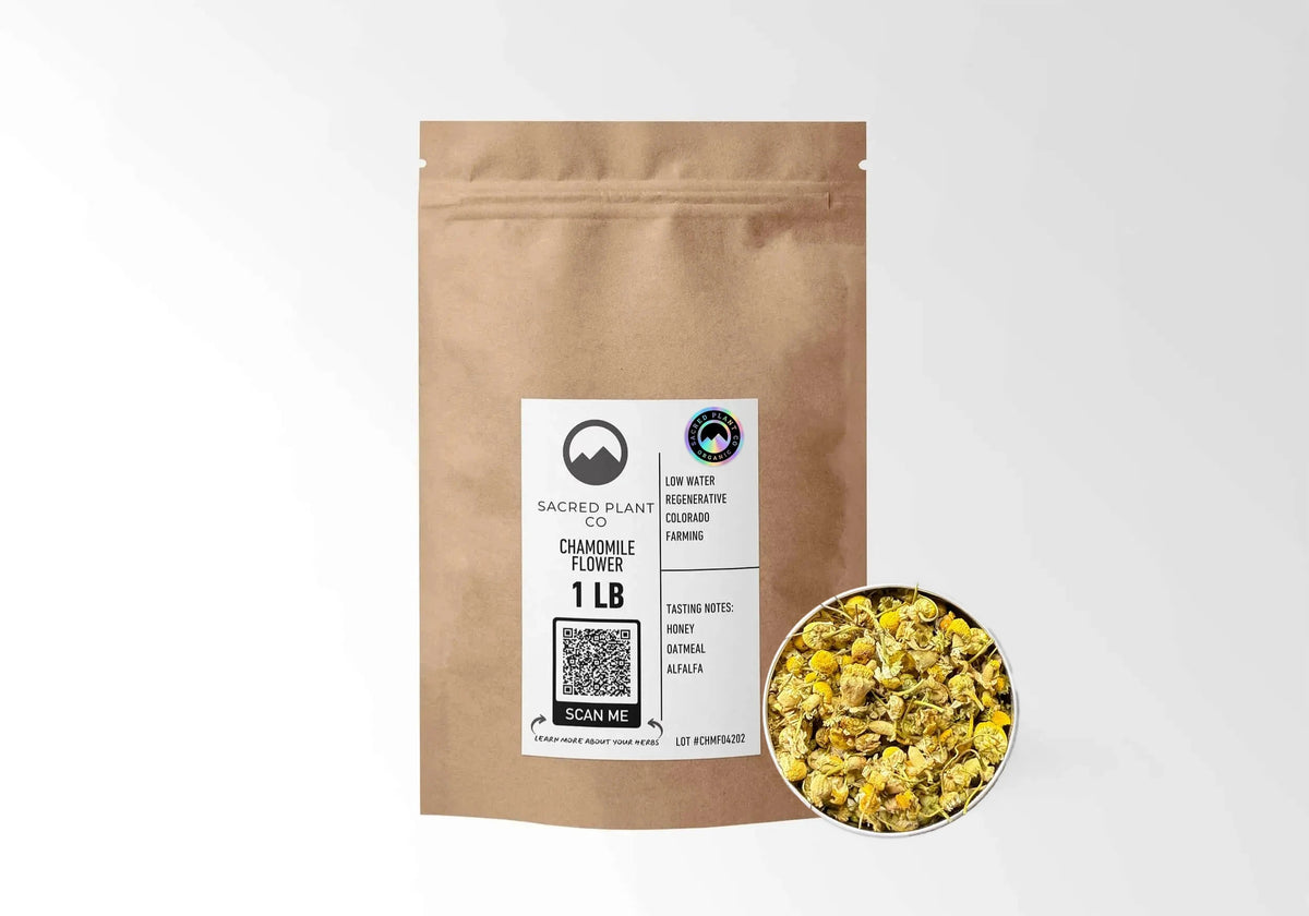 Sacred Plant Co Organic Chamomile 1 LB kraft stand-up pouch shown with a sample of the herb.