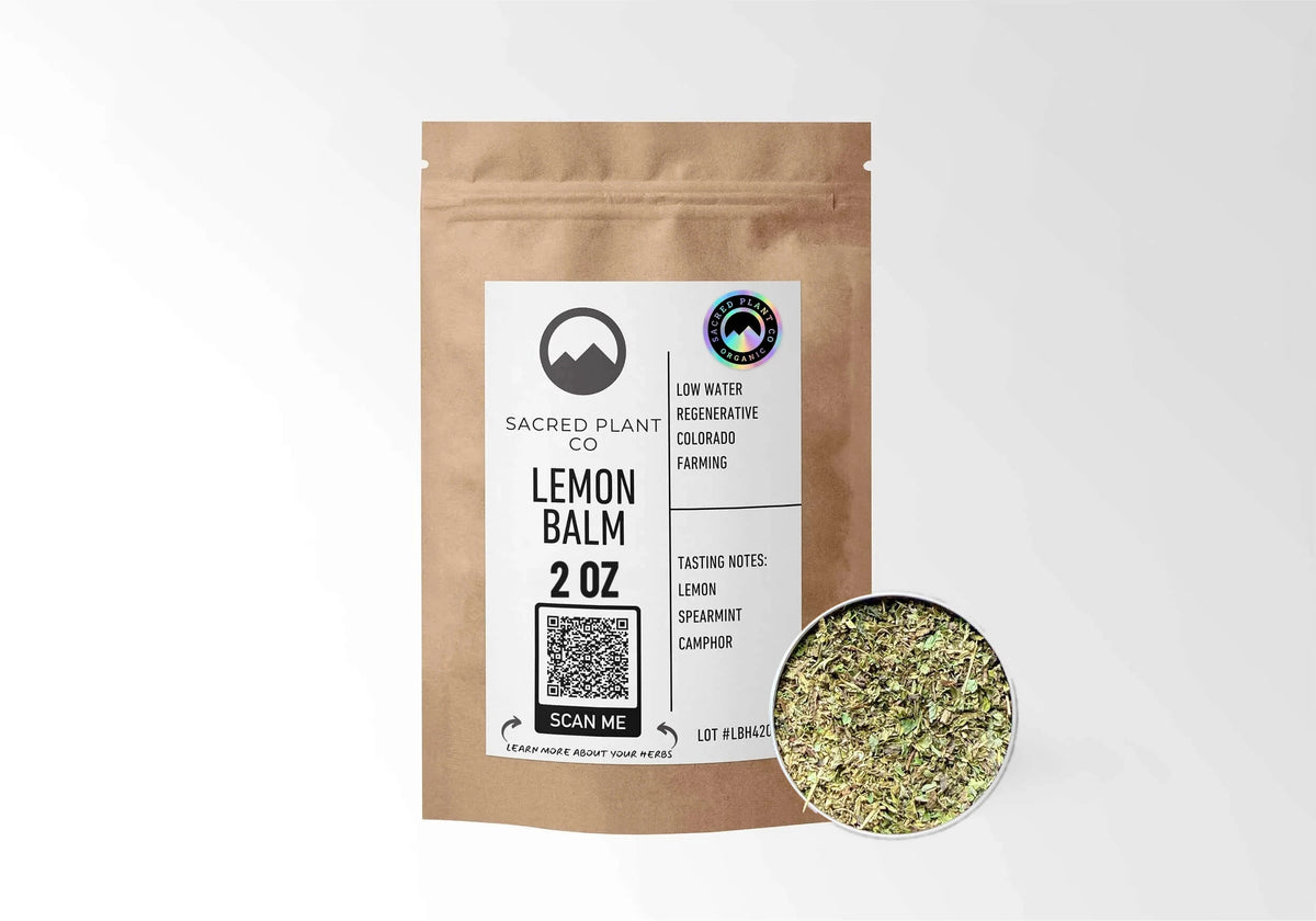 Sacred Plant Co Organic Lemon Balm 2 oz kraft stand-up pouch shown with a sample of the herb.