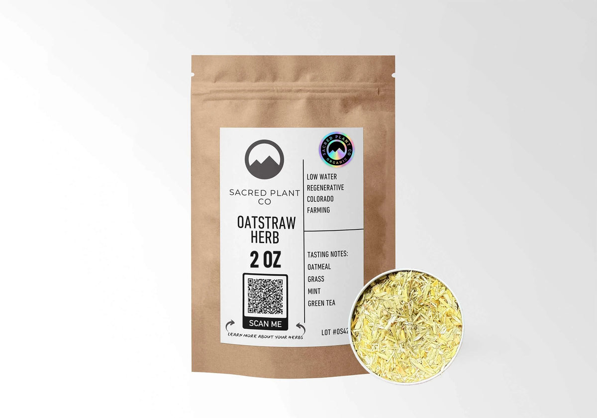 Sacred Plant Co Organic Oatstraw Herb 2 oz in a kraft stand-up pouch with the holographic organic seal on the label and a sample of cut and sifted oatstraw in a silver tin.