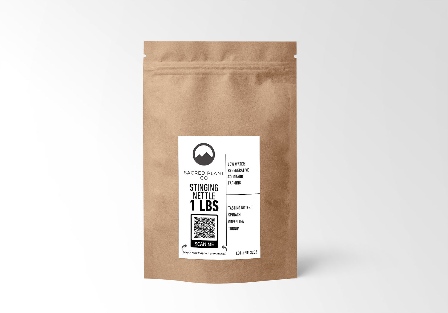 A 1-pound brown kraft paper bag labeled Sacred Plant Co Stinging Nettle, featuring low water regenerative Colorado farming, with tasting notes of spinach, green tea, and turnip. A QR code for more information is also visible.&quot;