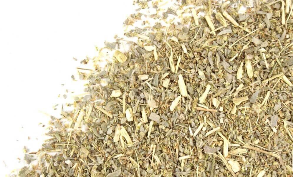 Loose Wormwood Herb from Sacred Plant Co, textured green and yellow mix on white background, highlighting premium quality.