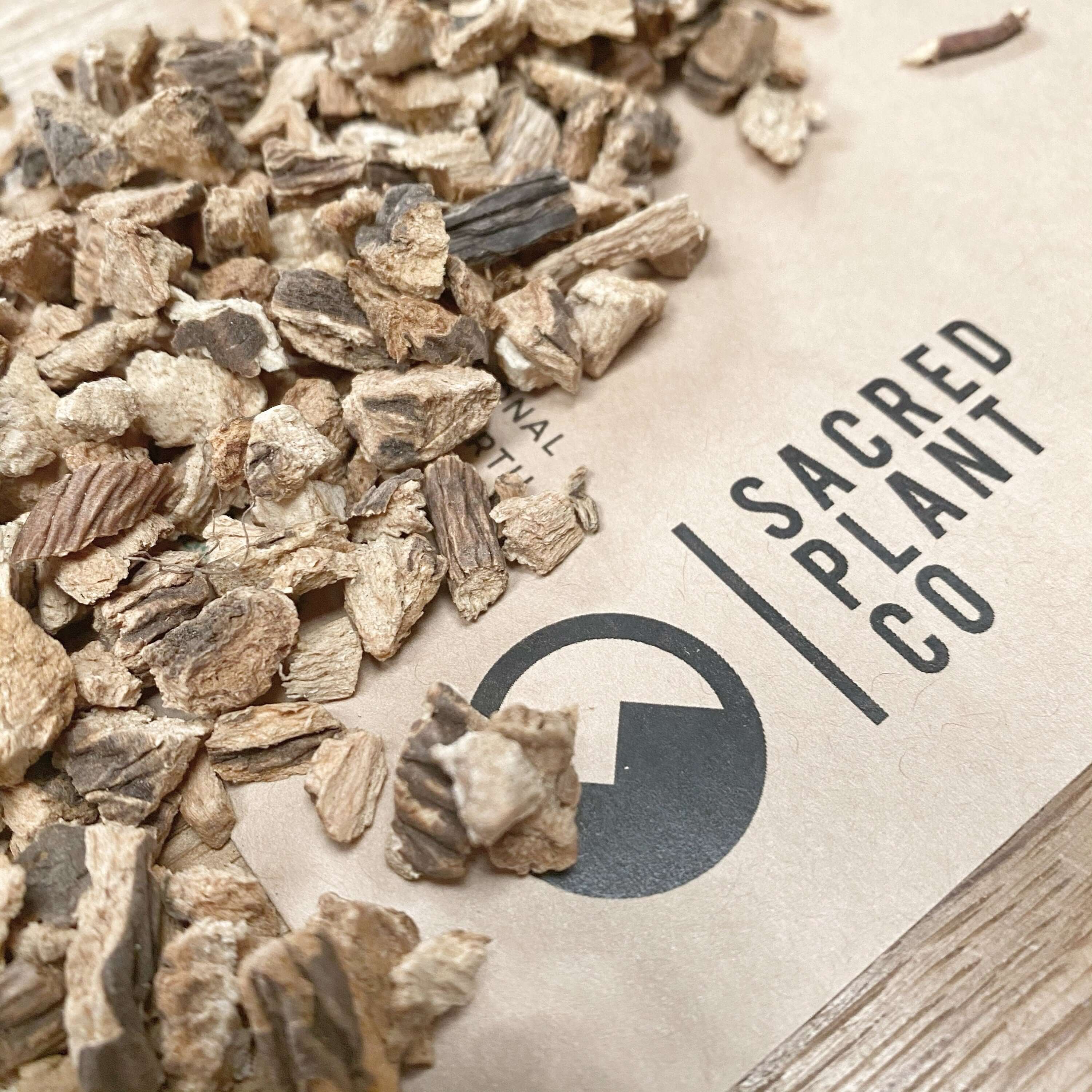 Roughly chopped Gentian Root, close-up angle, emphasizing Sacred Plant Co&