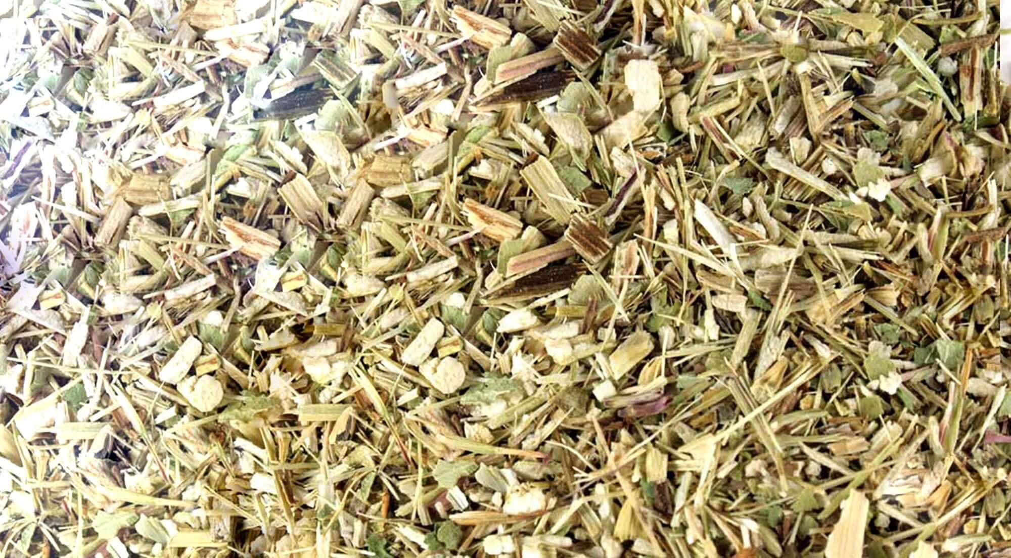 Finely chopped premium Echinacea Herb with natural green and earthy hues, showcasing Sacred Plant Co&