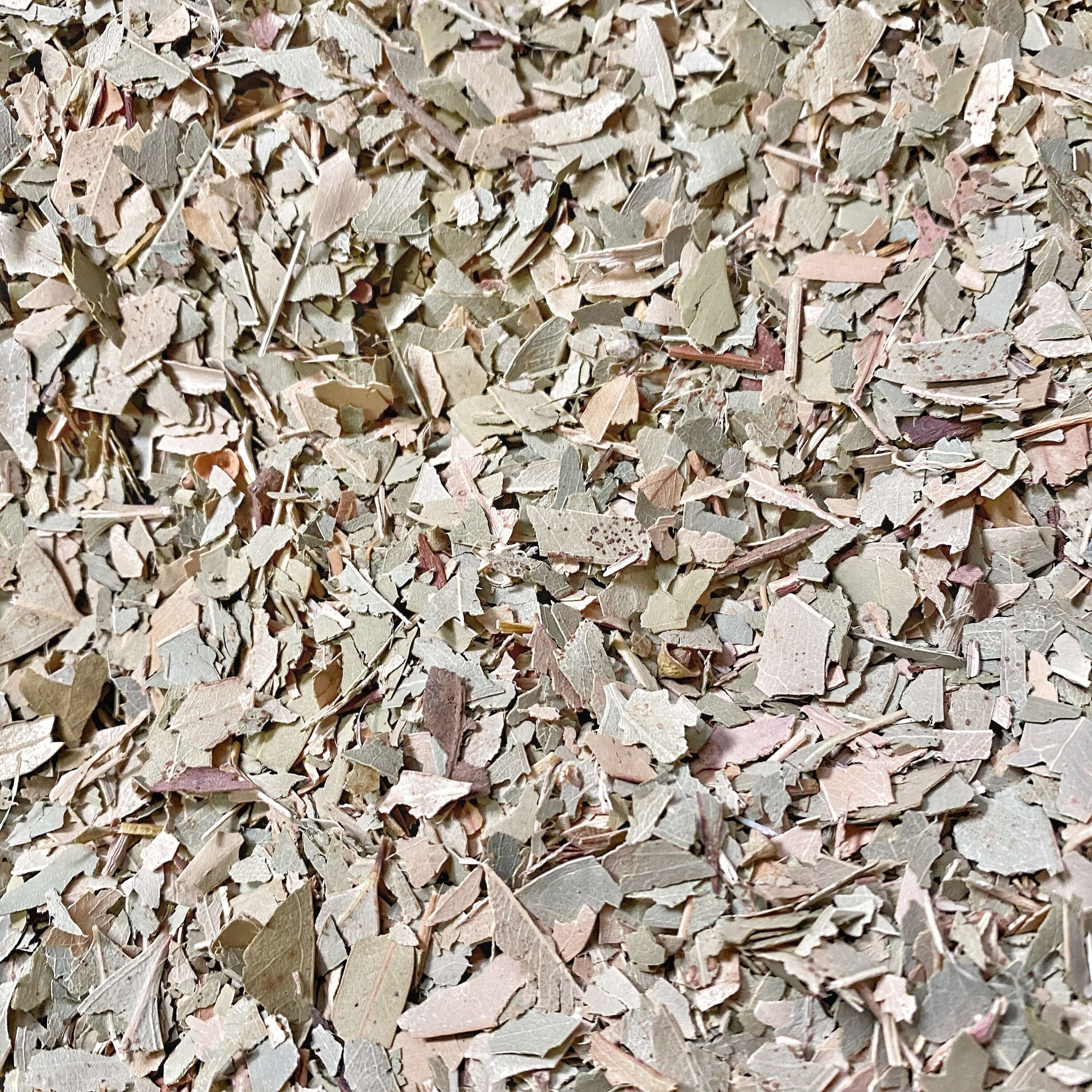 Sacred Plant Co Eucalyptus Leaves, chopped and dried, showcasing detailed texture and organic green tones for high-quality herbal use.