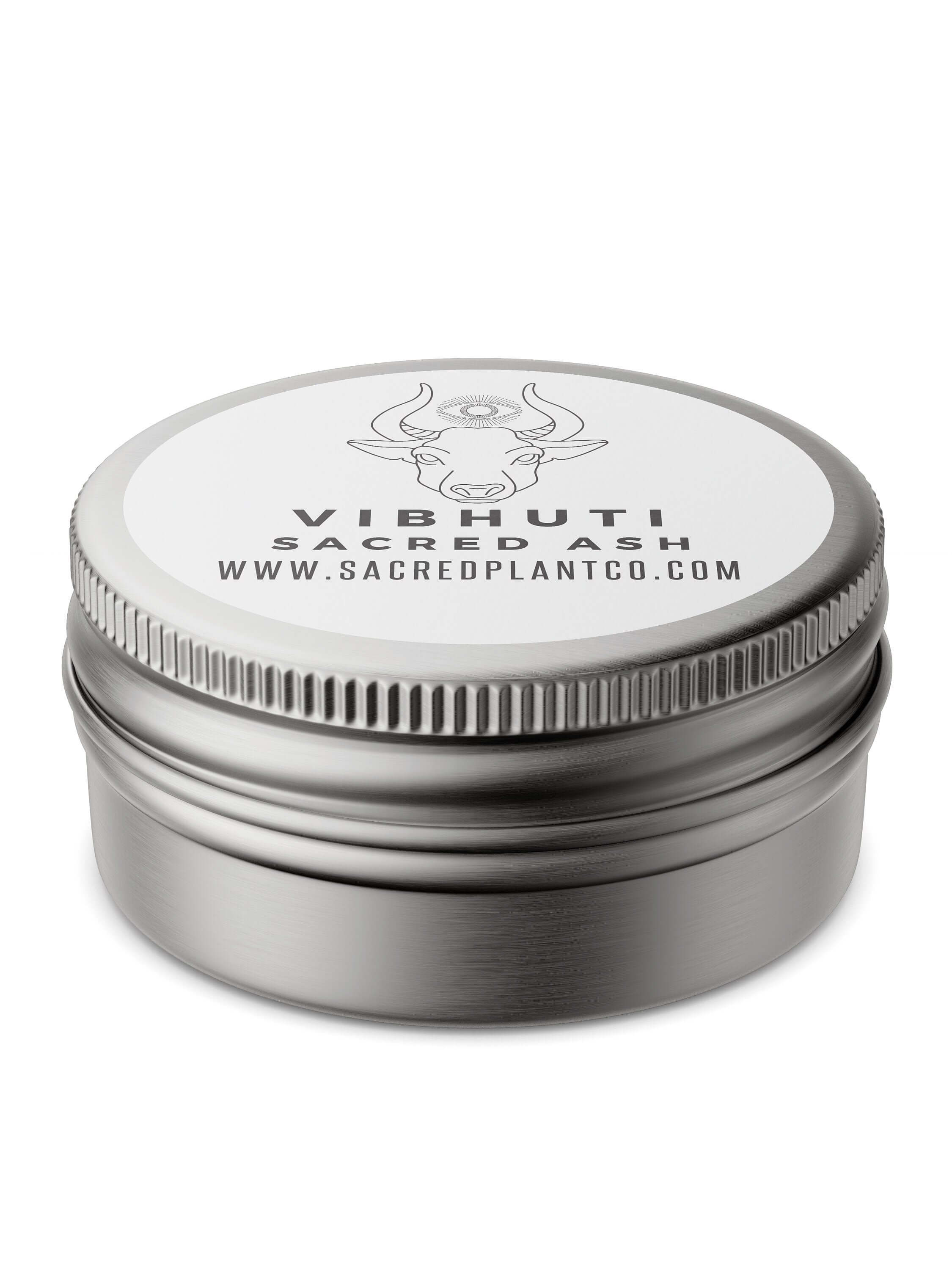 Vibhuti Sacred Ash container with intricate cow and third eye design on the lid, reflecting Hindu spirituality, from Sacred Plant Co, set against a white backdrop.