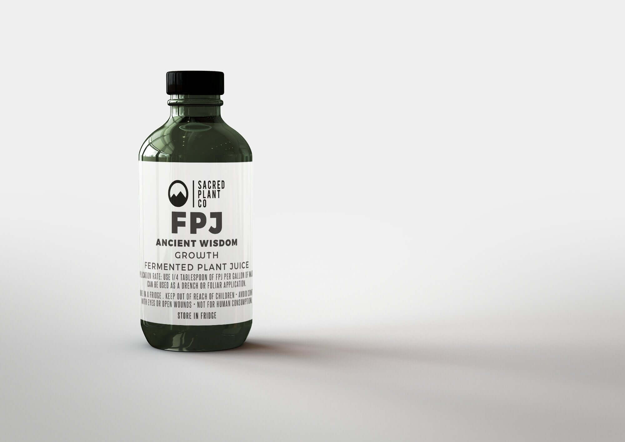 Distant view of our Ancient Wisdom GROWTH - FPJ bottle, capturing the distinct branding of our Low Water Colorado Mountain Herb Farm products