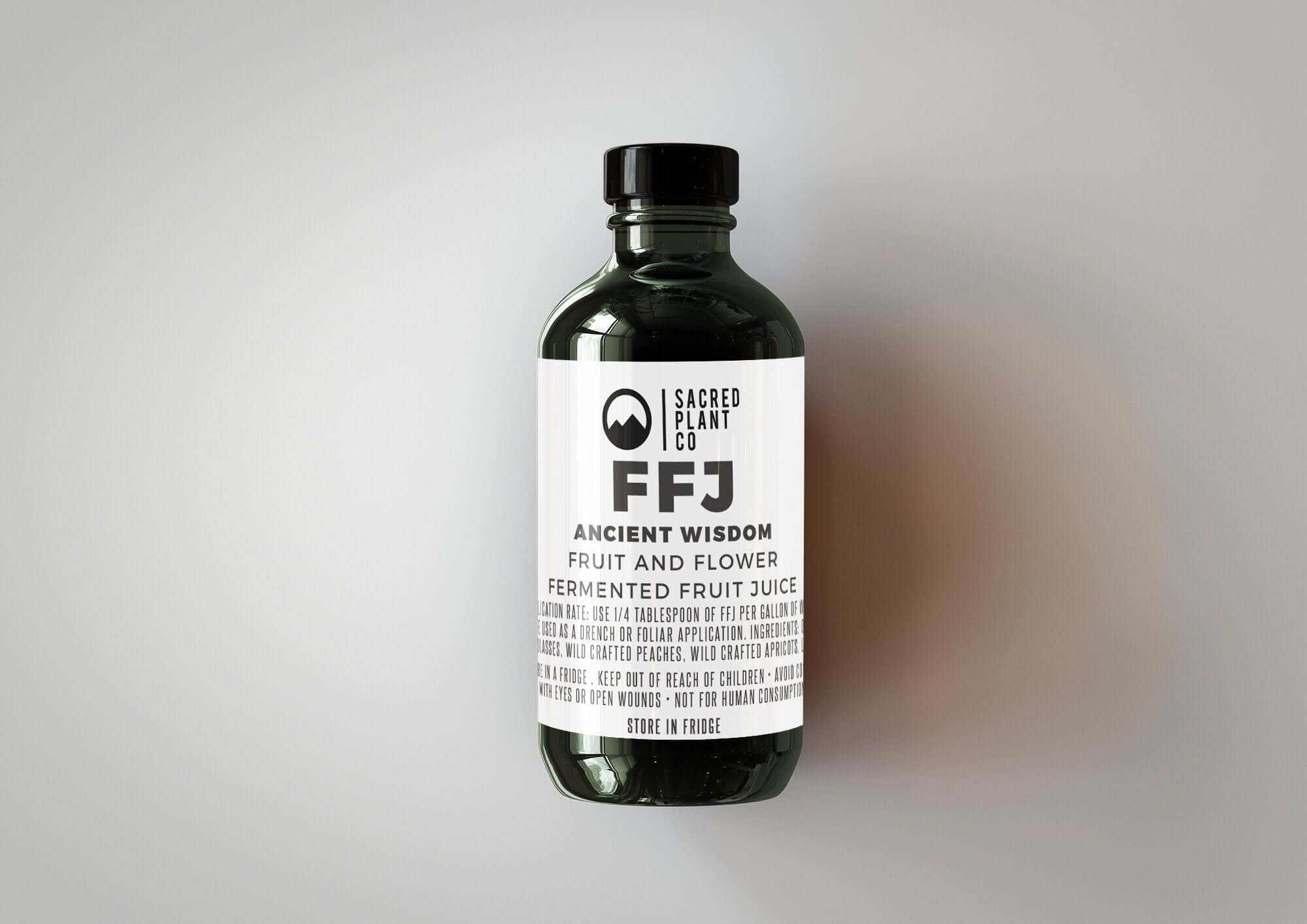 Bottle of our nutrient-rich FRUIT & FLOWER - Fermented Fruit Juice, proudly produced at Low Water Colorado Mountain Herb Farm