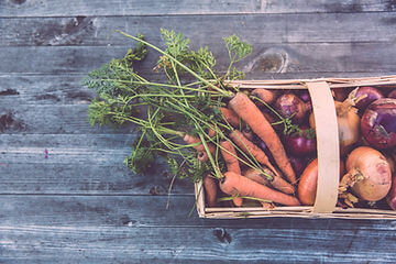 Imperator Carrot in box with other vegtables. 