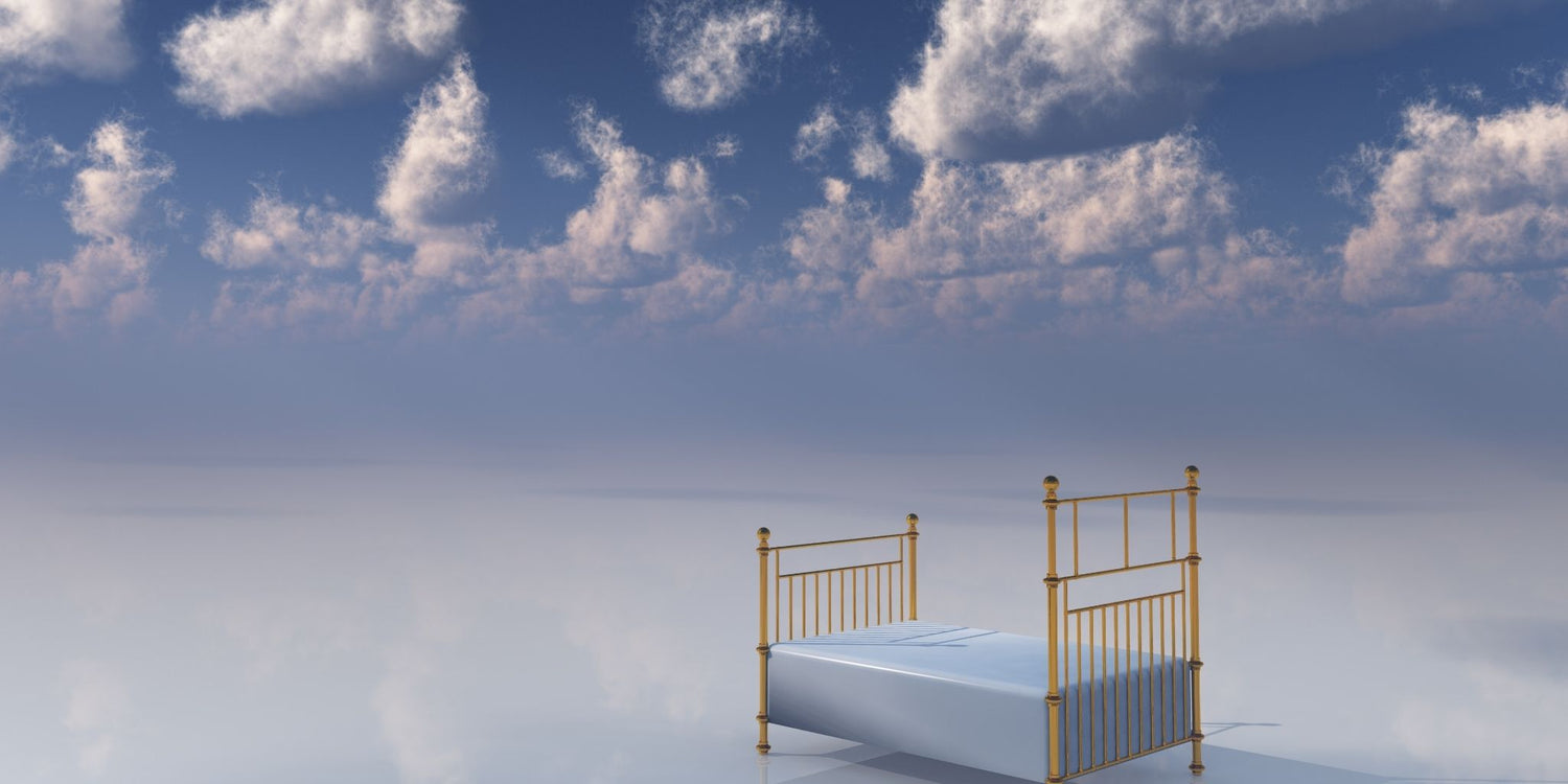 Golden bed floating on a reflective surface beneath a cloudy sky, symbolizing enhanced sleep and the journey into lucid dreaming.