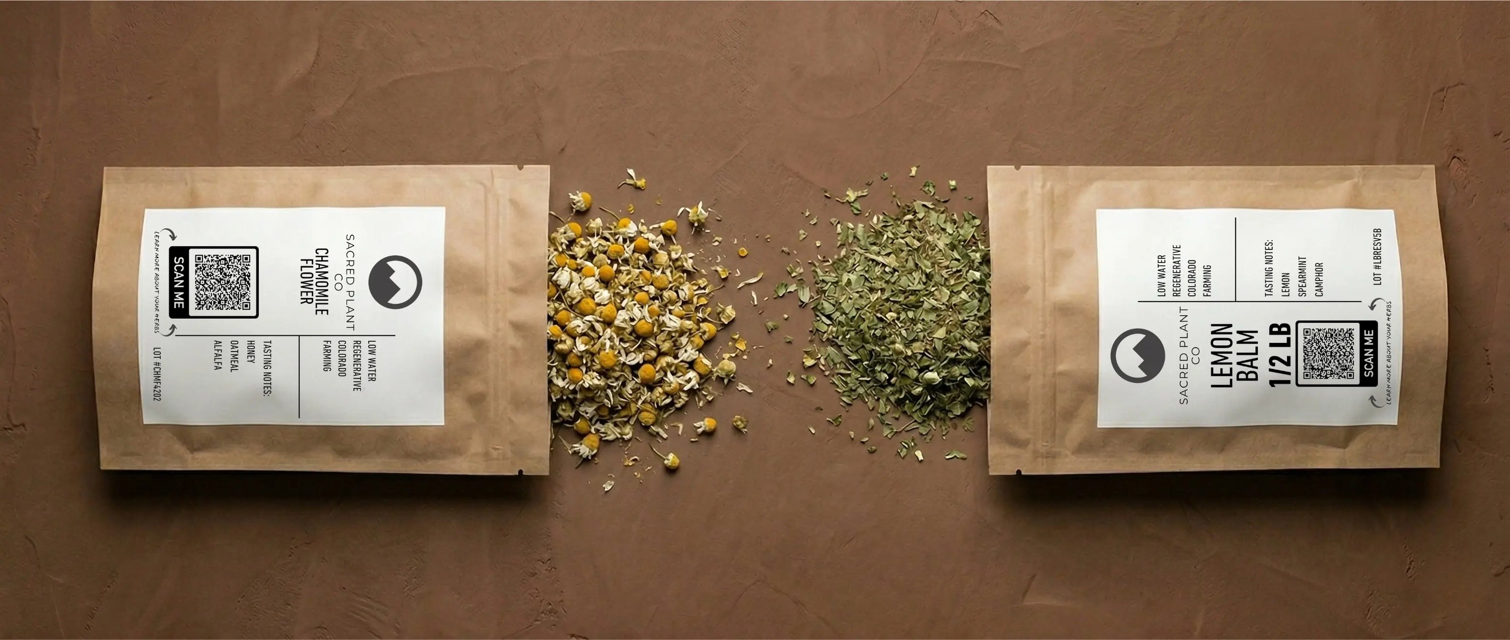Lemon balm vs chamomile flower comparison: Sacred Plant Co kraft bags spilling dried green lemon balm leaves and whole yellow chamomile blossoms.