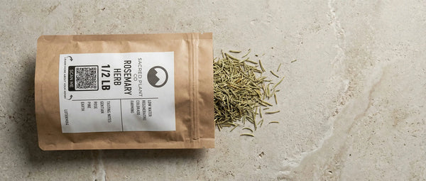 Sacred Plant Co bulk Rosemary Herb (1/2 LB) spilling from a resealable kraft bag. Premium dried rosemary grown via regenerative farming.
