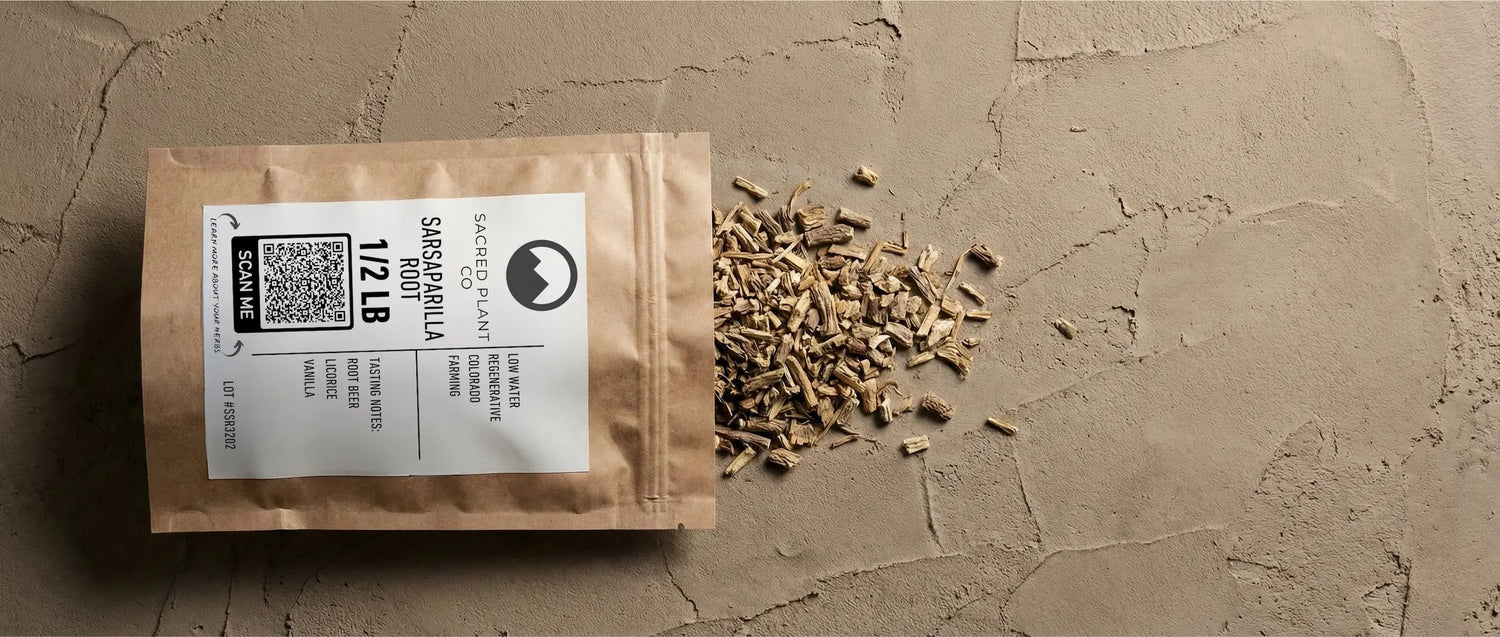Dried Hemidesmus indicus roots spilling from eco-friendly packaging, showing the cut and sifted texture used for Ayurvedic blood purification.