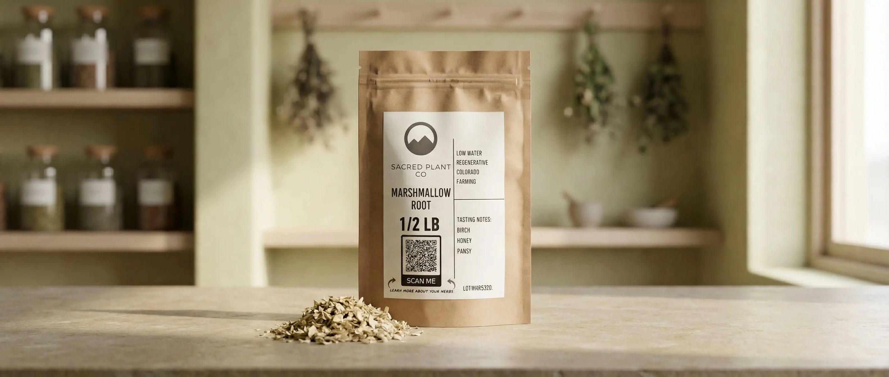 Sacred Plant Co 1/2 LB Marshmallow Root bag displayed with a pile of dried cut and sifted root, highlighting low-water regenerative Colorado farming for potent gut-healing mucilage.