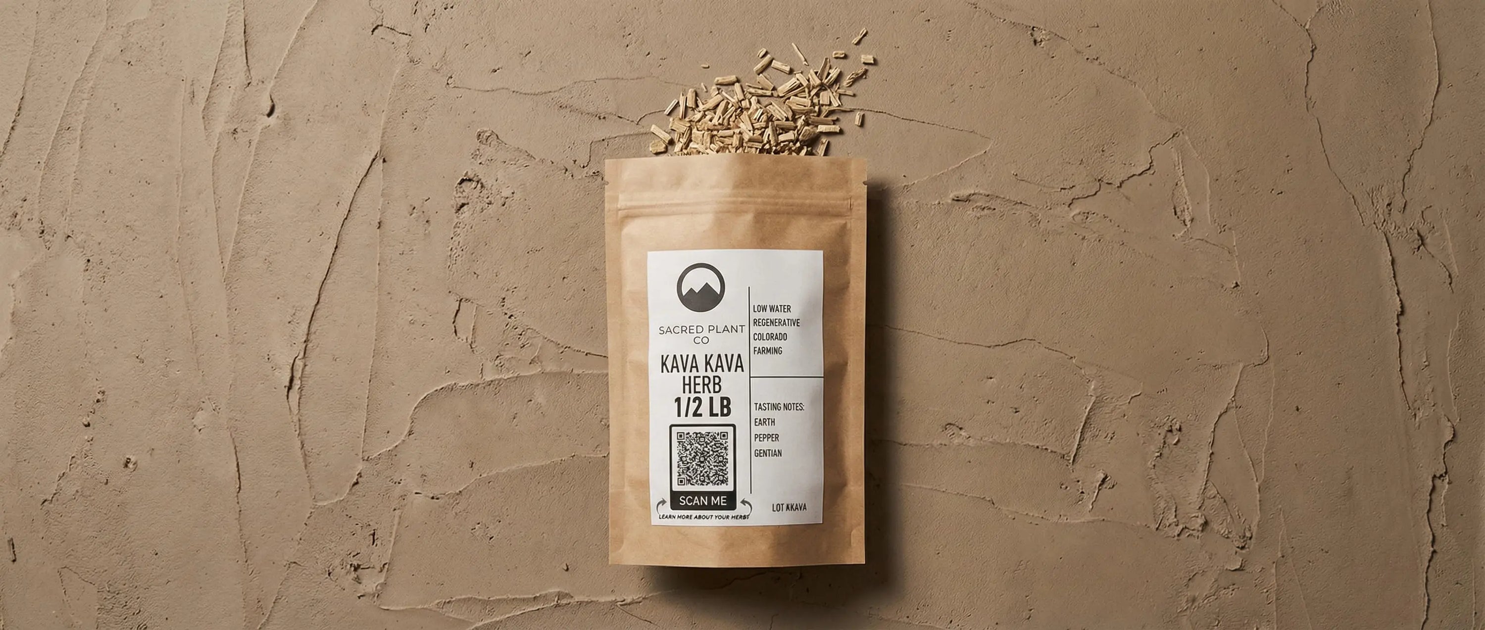 Close-up of dried Kava Kava root showing woody texture and color, labeled with tasting notes of earth, pepper, and gentian.