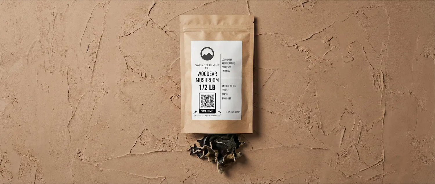 Packaging for regenerative wood ear mushrooms showing QR code and tasting notes of forest, earth, and sawdust.