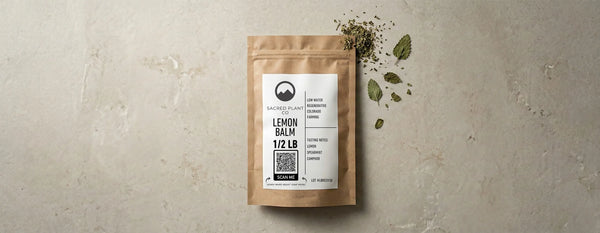 Sacred Plant Co bag of lemon balm on stone background. 