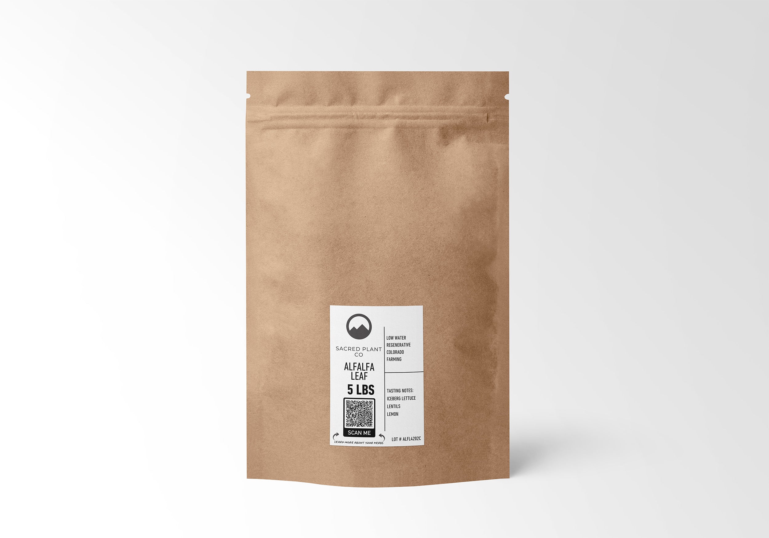 Eco-friendly kraft paper bag containing 5 LBS of premium Sacred Plant Co Alfalfa Leaf, sustainably farmed in Colorado. Rich in vitamins and minerals, ideal for natural health remedies.