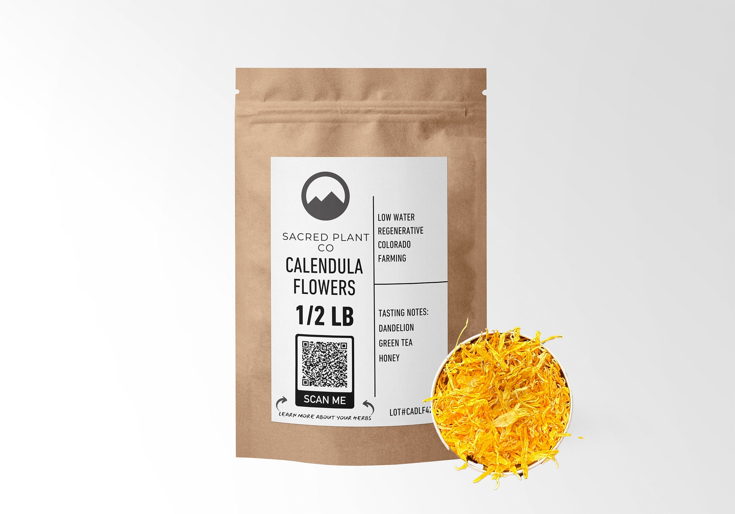 Sacred Plant Co Calendula Flowers 1/2 LB in eco-friendly kraft paper packaging, with a sample of the herb in a silver tin, valued for promoting skin health and soothing inflammation.