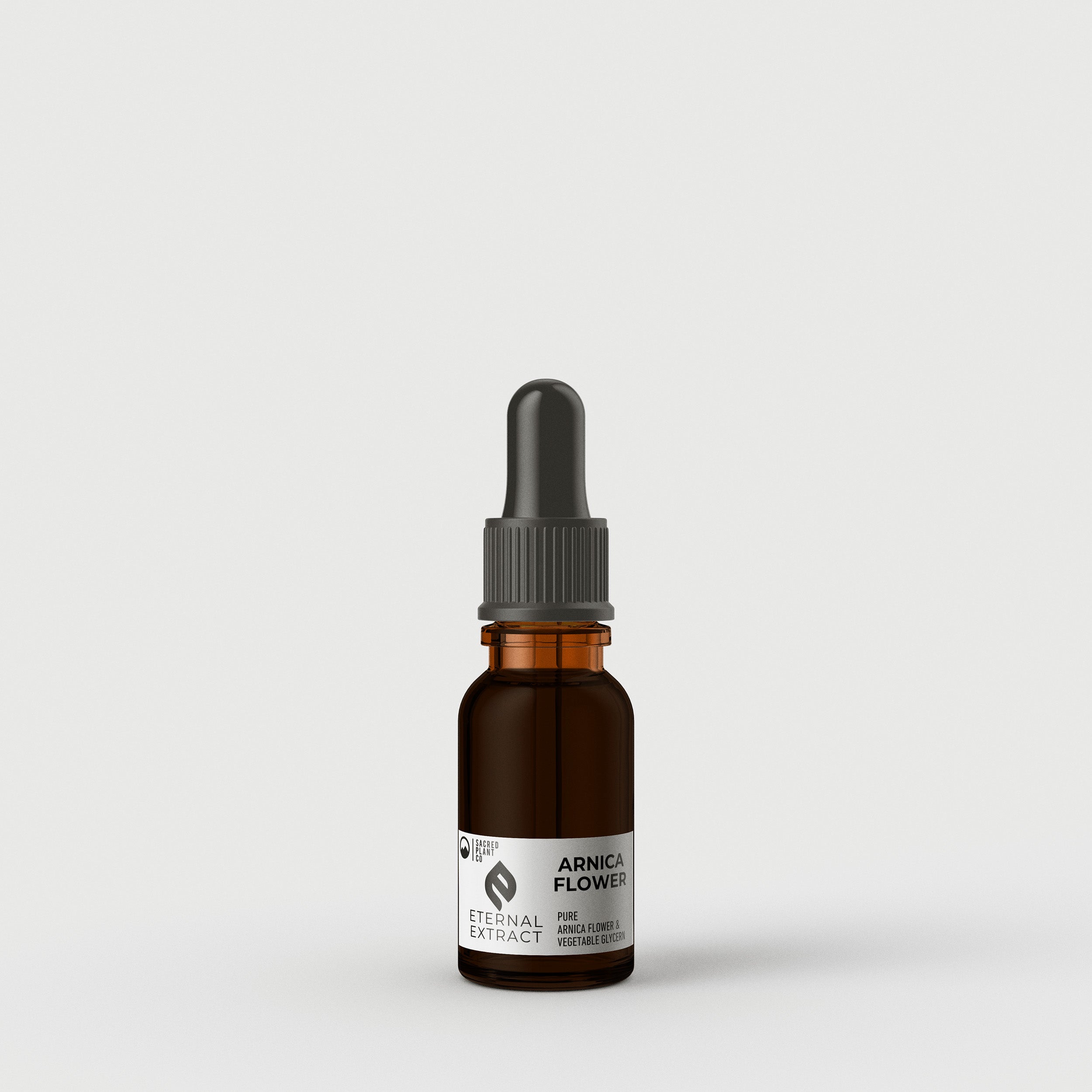 Half OZ Sacred Plant Co Eternal Arnica Flower Tincture in a quality amber glass bottle for use in herbal remedies.