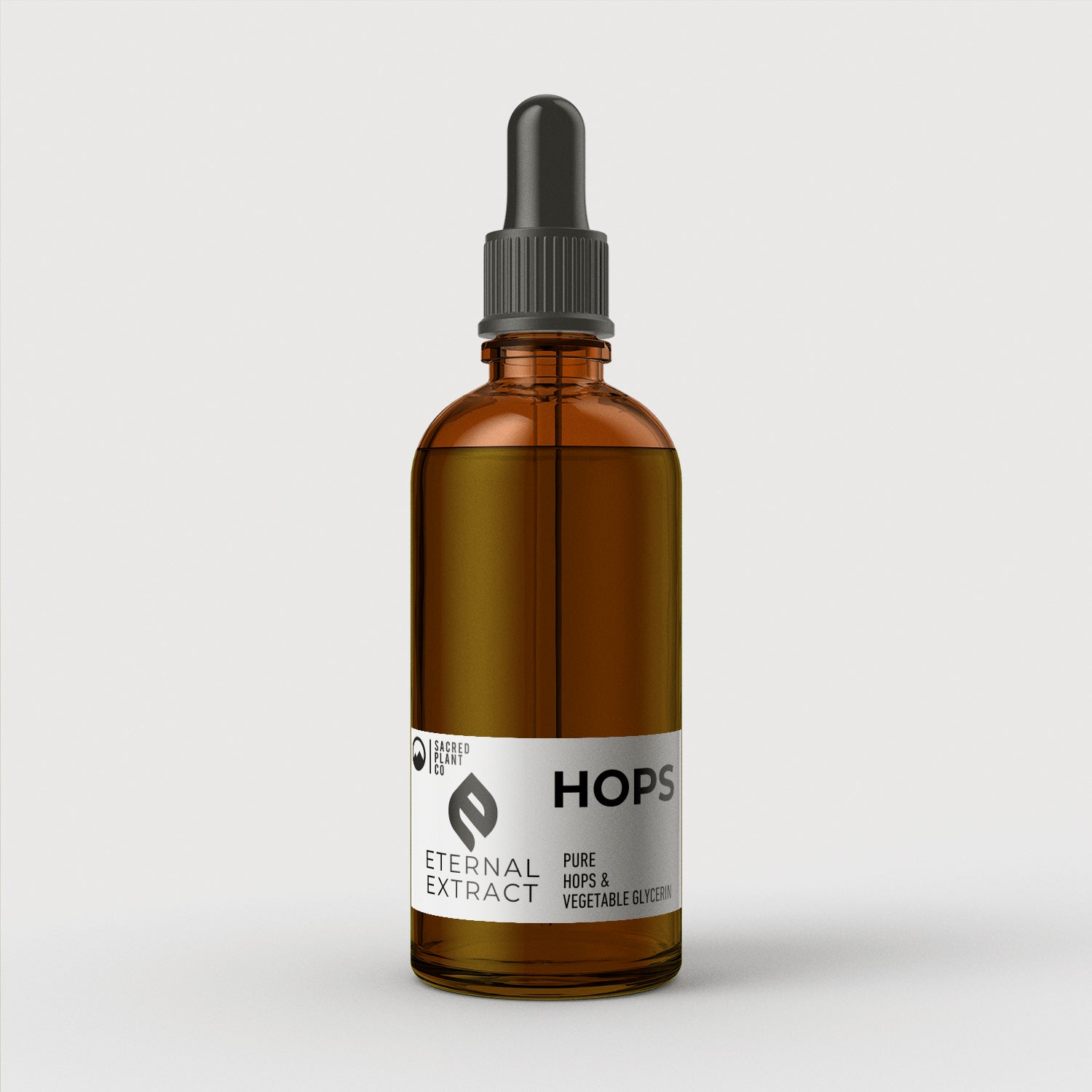 Eternal Extract Hops Tincture in a large amber bottle by Sacred Plant Co, showcasing pure hops and vegetable glycerin ingredients.