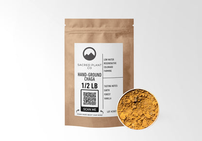 Sacred Plant Co Hand-Ground Chaga 1/2 LB kraft paper packaging with herb sample in silver tin showcasing sustainably harvested chaga mushroom for immune support and antioxidant properties.