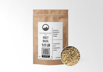 Sacred Plant Co Holy Basil 1/2 LB in eco-friendly kraft paper packaging, with a sample of the herb in a silver tin, known for stress relief and promoting overall wellness.