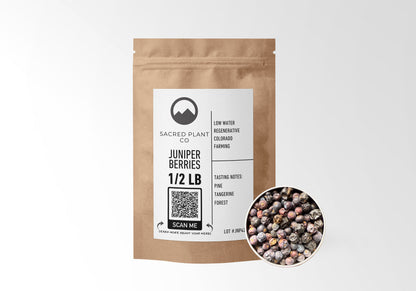 Sacred Plant Co Juniper Berries 1/2 LB in eco-friendly kraft paper packaging with a sample in a silver tin, commonly used for digestive health and as a natural diuretic.