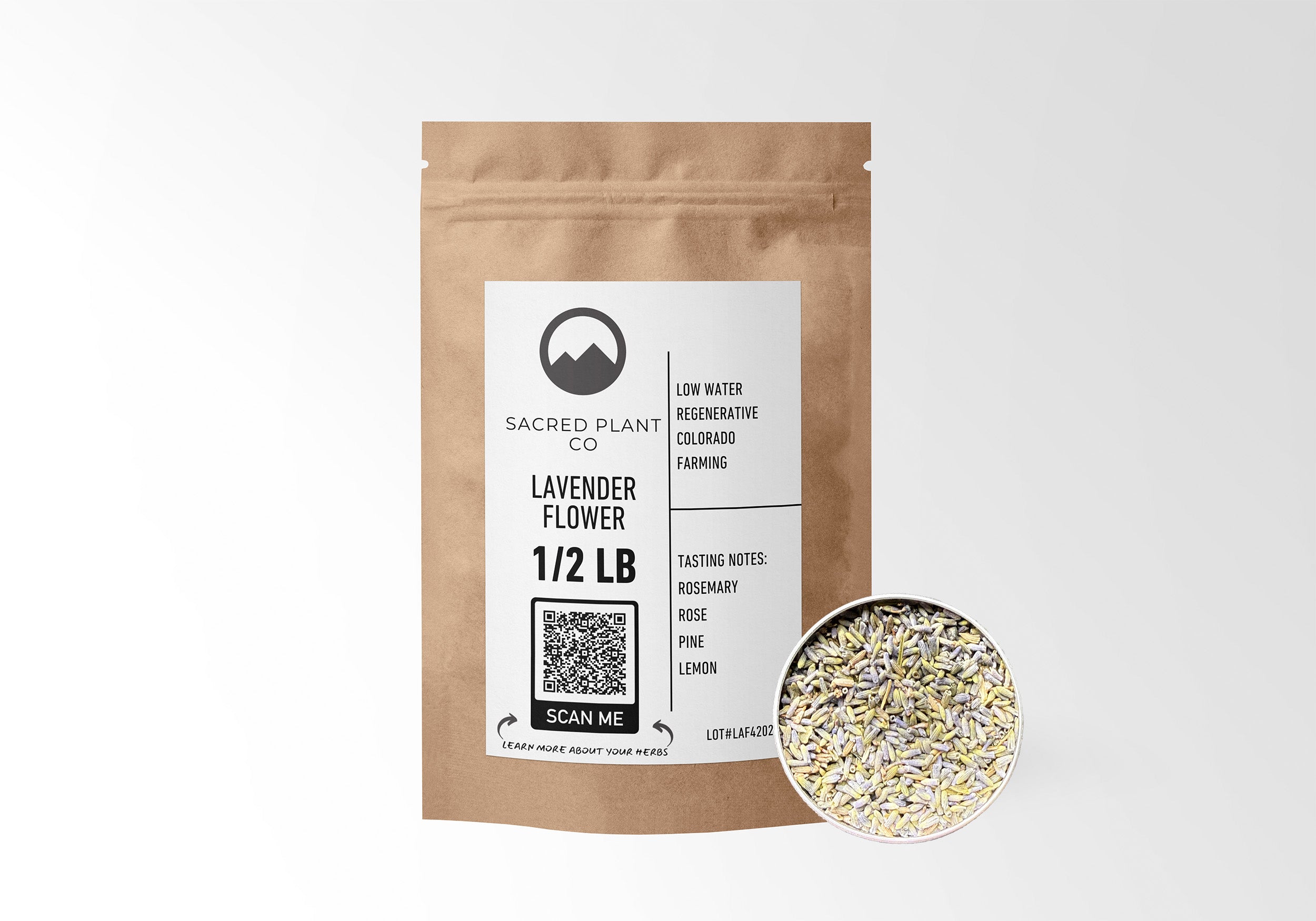 Sacred Plant Co Lavender Flower 1/2 LB in eco-friendly kraft paper packaging, with a sample of the herb in a silver tin, ideal for relaxation and stress relief.