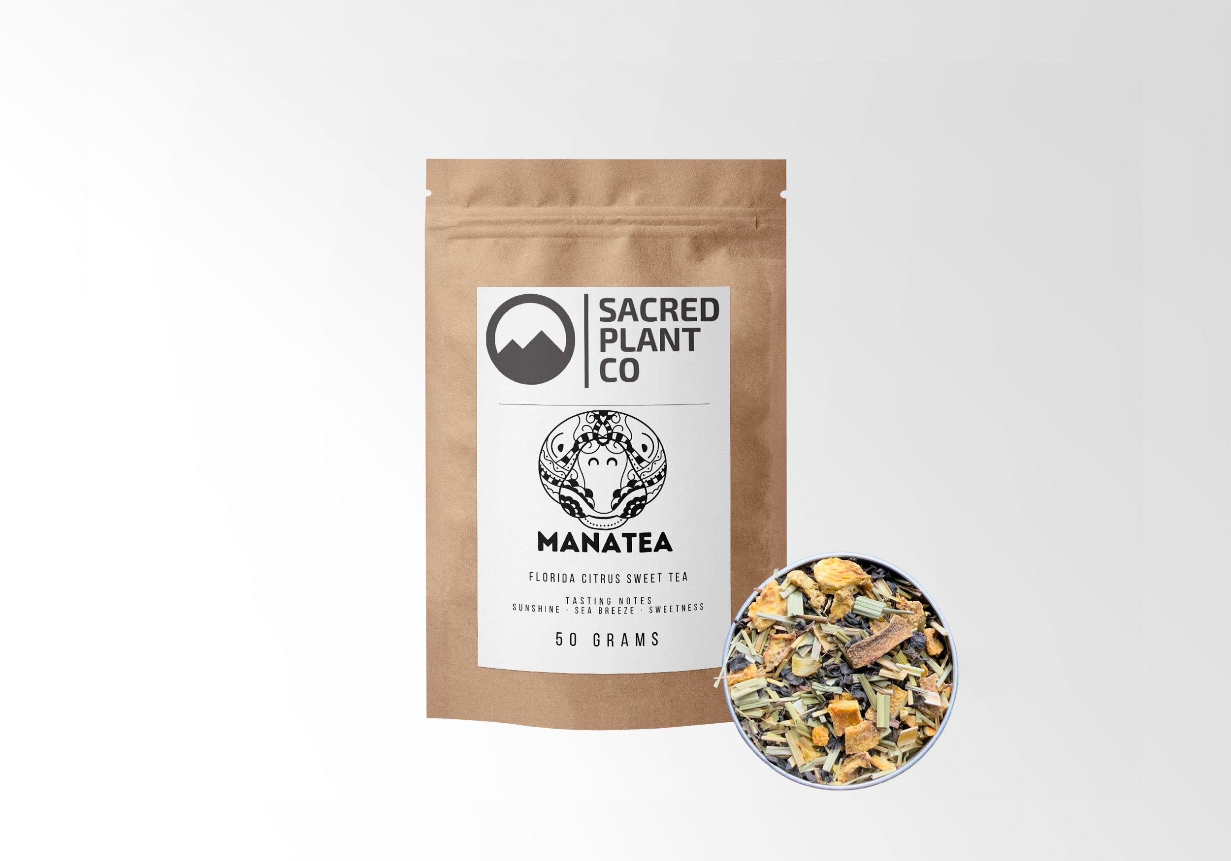 Front view of Manatea, 50 grams kraft bag by Sacred Plant Co, with a silver tin showcasing sweet Florida citrus loose tea blend, sunshine-infused.