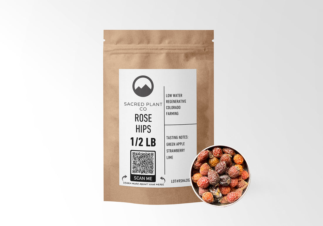 Sacred Plant Co Rose Hips 1/2 LB in kraft paper packaging, featuring a sample of herb in a silver tin, highlighting its use for immune support and natural health.