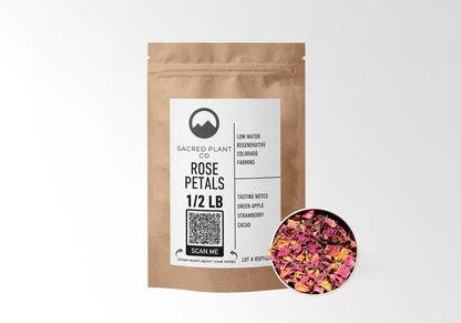 Sacred Plant Co Rose Petals 1/2 LB in kraft paper packaging, featuring a sample of herb in a silver tin, highlighting its use for natural skincare and relaxation.