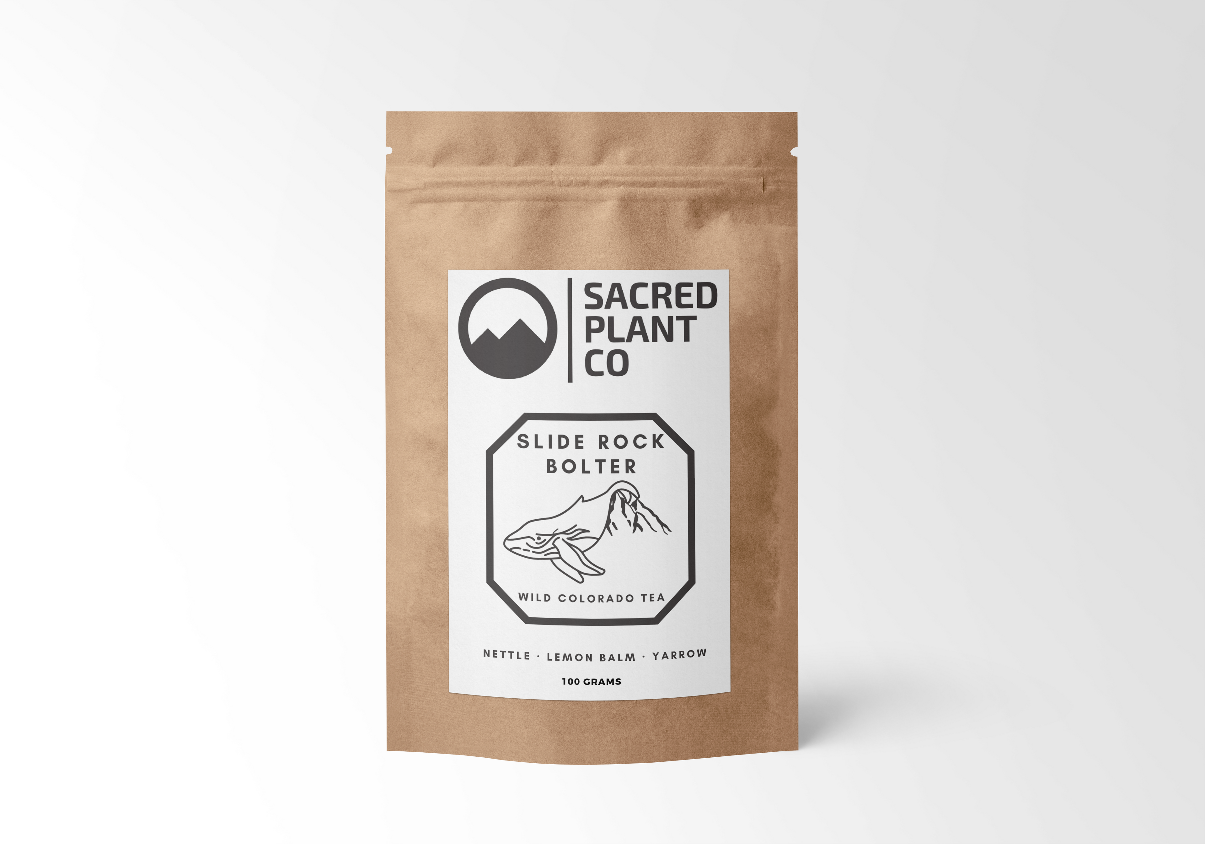 A kraft paper pouch from Sacred Plant Co showcases their Slide Rock Bolter Wild Colorado Tea. The clean, white background accentuates the pouch&