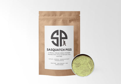 Sacred Plant Co Sasquatch Piss Green Powder in eco-friendly kraft paper packaging, sample in a silver tin, a primal forage blend designed to provide a potent mix of wild nutrition for overall health and vitality.