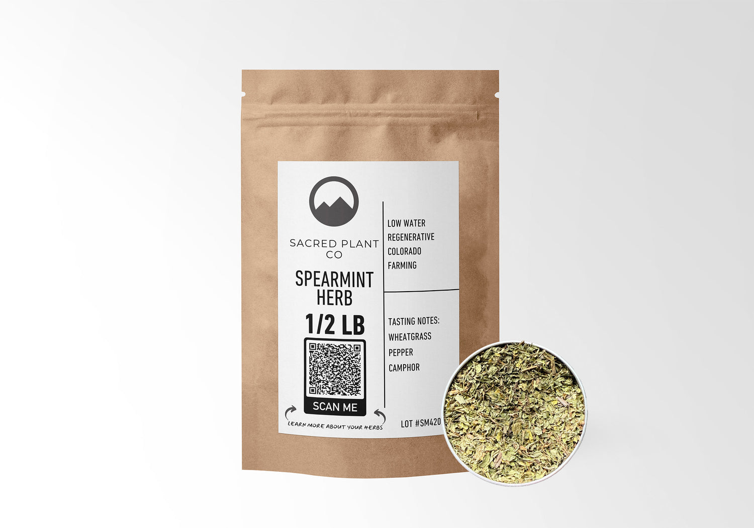 Sacred Plant Co Spearmint Herb 1/2 LB in eco-friendly kraft paper packaging, with a sample of the herb in a silver tin, promotes digestive health and refreshment.