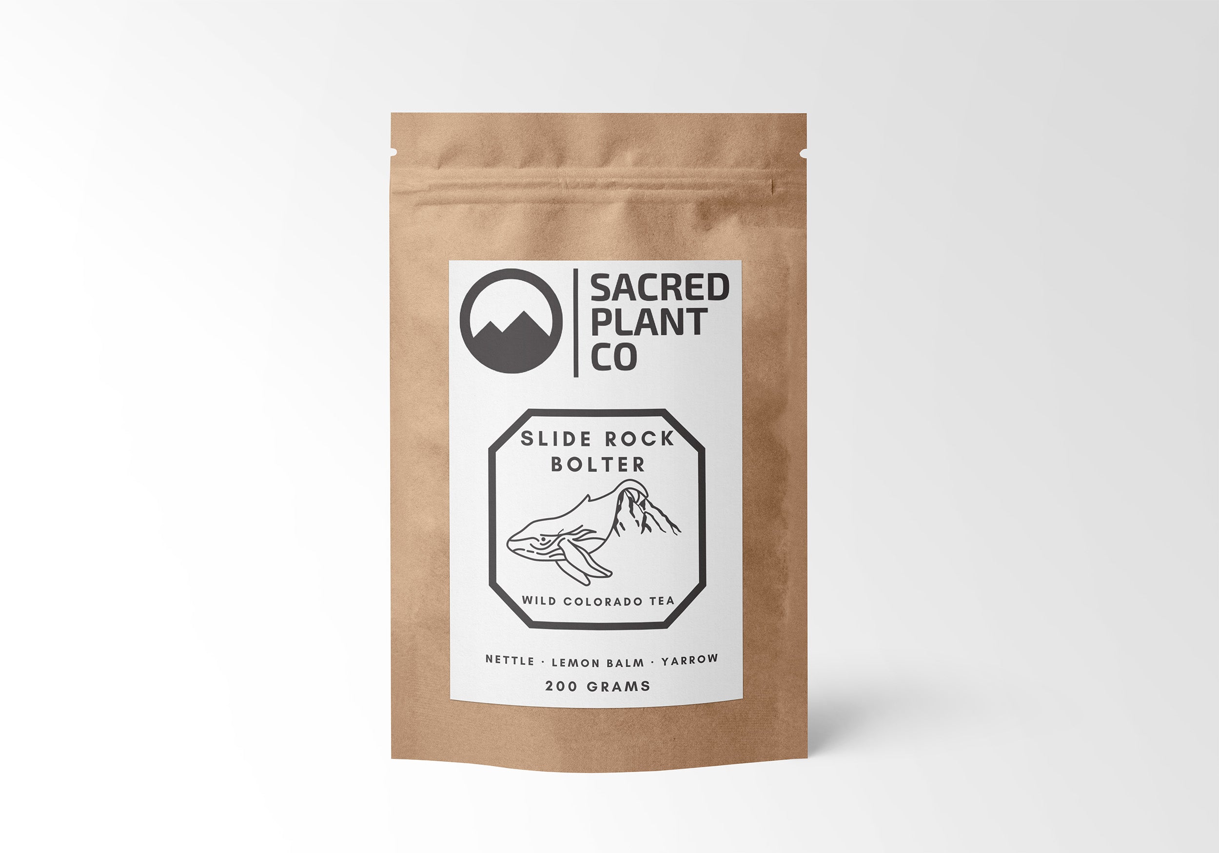 Sacred Plant Co’s kraft paper bag 200g eco-friendly Wild Colorado Tea with Nettle, Lemon Balm, and Yarrow, sustainably harvested high-quality, farmed herbs for wellness.