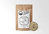 Sacred Plant Co Slide Rock Bolter Wild Colorado Tea 50 grams in eco-friendly kraft paper packaging with a sample in a silver tin, featuring nettle, lemon balm, and yarrow for a soothing herbal blend.