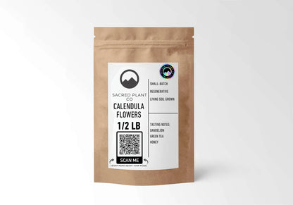 A 1/2 lb kraft bag of Sacred Plant Co dried Calendula flowers, displaying the black mountain logo and small-batch regenerative farming label.