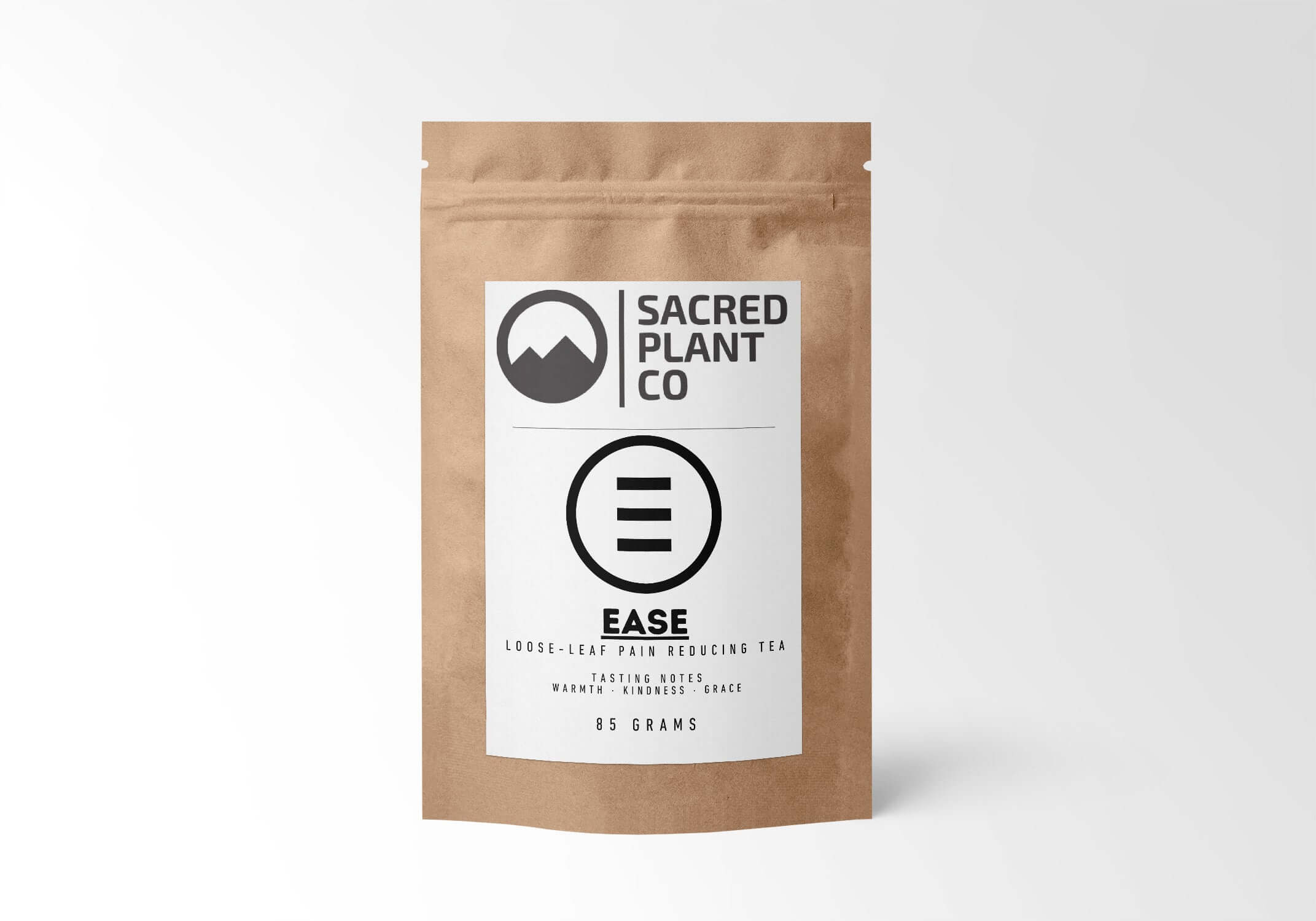 Sacred Plant Co Ease Herbal Tea 85g Bag front view with eco-friendly kraft paper packaging, pain-relieving blend of Holy Basil and White Willow Bark for soothing inflammation, crafted with sustainable farming practices.