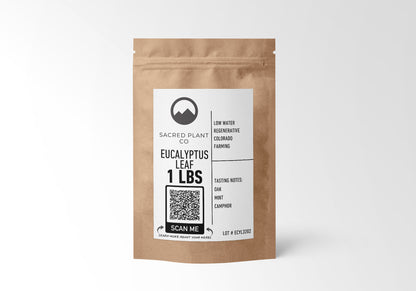 One-pound brown paper packaging for eucalyptus leaves by Sacred Plant Co, featuring a QR code and descriptions of low water use and regenerative farming