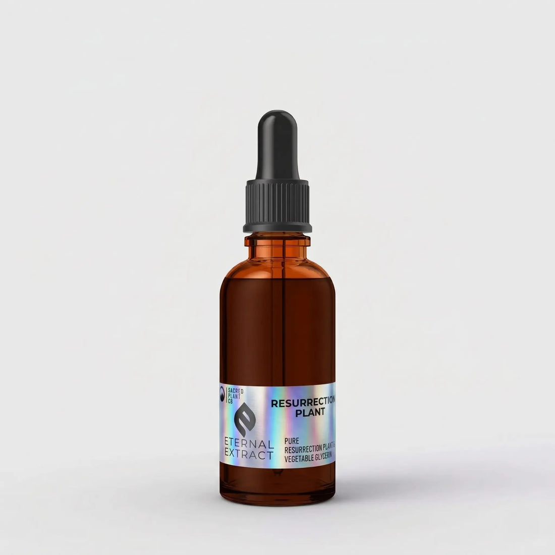 A one-ounce amber glass dropper bottle of High-Potency Resurrection Plant Extract by Sacred Plant Co. The bottle features the new holographic Eternal Extract label and is isolated on a clean white background.